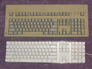 Apple Extended Keyboard and white USB keyboard