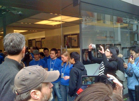 long line of customers in front of the flagship Apple Store on Stockton Street in San Francisco