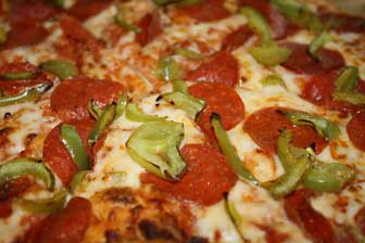 pepperoni and green pepper pizza