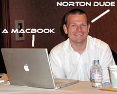 Norton's Rowan Trollope using a MacBook Pro