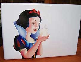 Snow White bites into an Apple MacBook