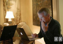HP Chairman Ray Lane using a MacBook Air at home