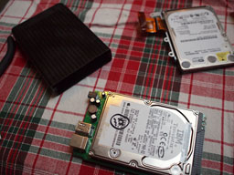 Two notebook drives and an enclosure