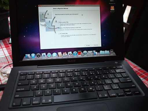 John Hatchett's black MacBook